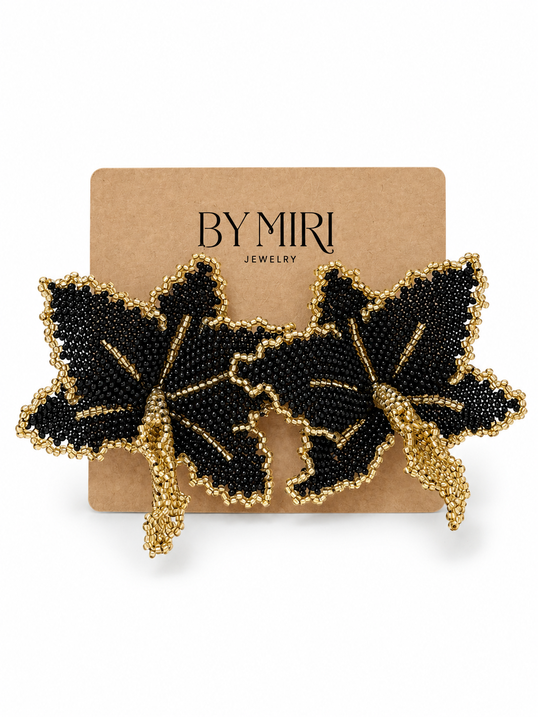 Aretes flor negra dorada