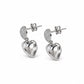 Aretes Doble Corazón Destello Plateado - Vista lateral mostrando detalle de circonias y corazón plateado