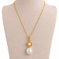 Collar Flor de Perla - Collar dorado con dije floral y perla orgánica protagonista