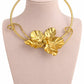 Collar Orquídea Dorada - Choker rígido dorado con gran orquídea en relieve escultórica